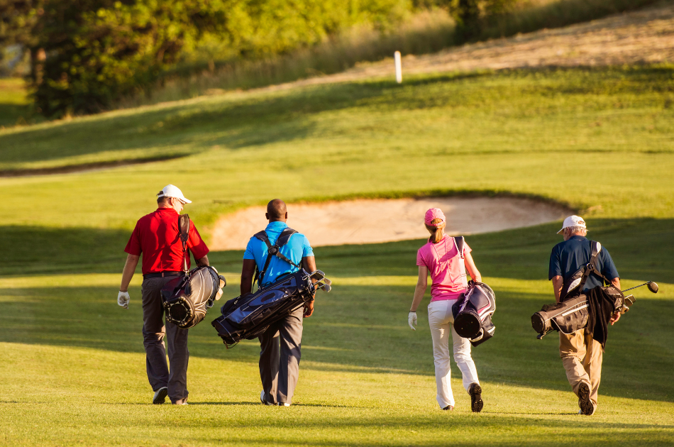 group of people golfing in Scotland