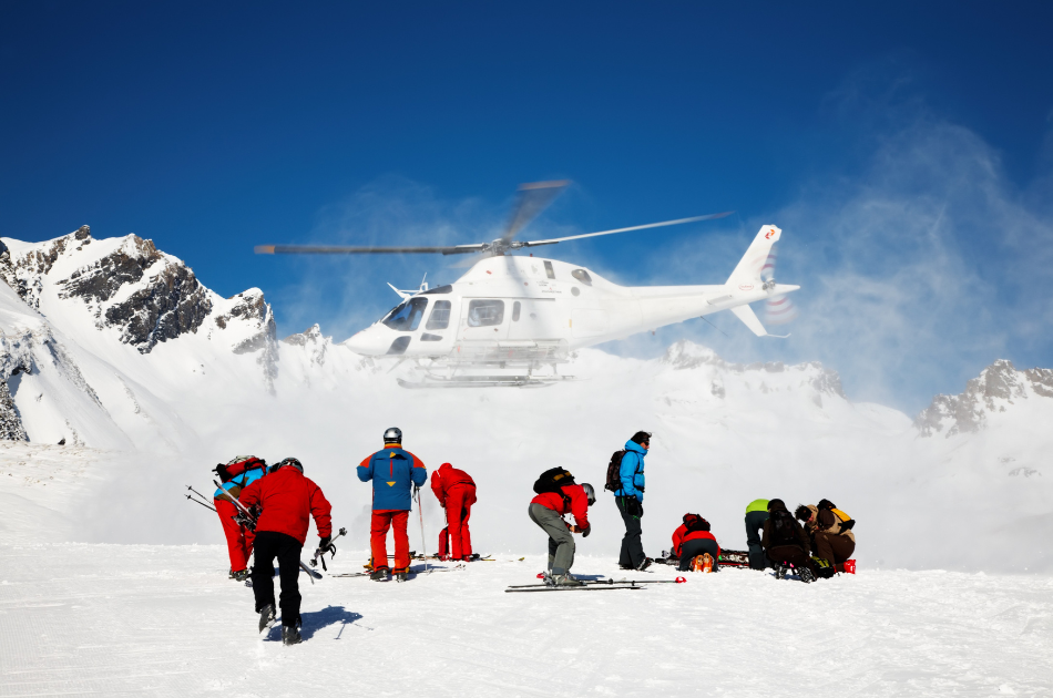 heli-skiing on top of a mountain